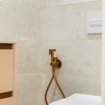 suple bidet dorado